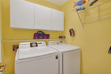 Welcome home to this beautiful Florida retreat with breezy Key on Fountain Lakes Community Golf Course in Florida - for sale on GolfHomes.com, golf home, golf lot