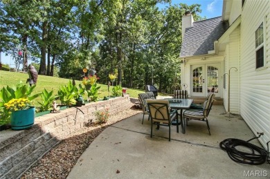 WOW! This beautifully built home on the 13th hole of Raintree on Raintree Country Club in Missouri - for sale on GolfHomes.com, golf home, golf lot
