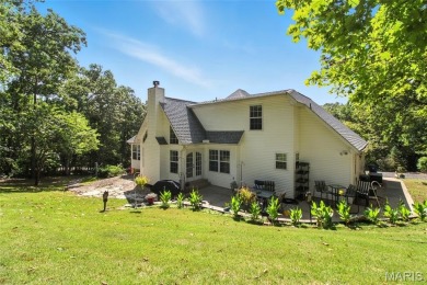 WOW! This beautifully built home on the 13th hole of Raintree on Raintree Country Club in Missouri - for sale on GolfHomes.com, golf home, golf lot