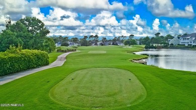 Waterfront overlooking a tranquil pond, this exquisitely on Members Club At St. James Plantation in North Carolina - for sale on GolfHomes.com, golf home, golf lot