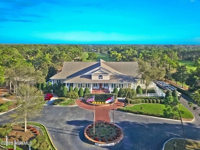 Waterfront overlooking a tranquil pond, this exquisitely on Members Club At St. James Plantation in North Carolina - for sale on GolfHomes.com, golf home, golf lot