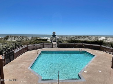 Waterfront overlooking a tranquil pond, this exquisitely on Members Club At St. James Plantation in North Carolina - for sale on GolfHomes.com, golf home, golf lot