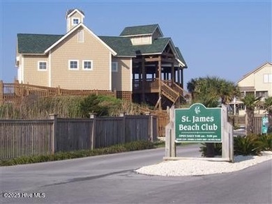 Waterfront overlooking a tranquil pond, this exquisitely on Members Club At St. James Plantation in North Carolina - for sale on GolfHomes.com, golf home, golf lot