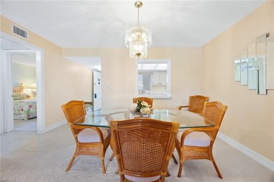 Welcome home to this bright and sunny second-floor, 2-bedroom on Royal Palm Golf Club in Florida - for sale on GolfHomes.com, golf home, golf lot