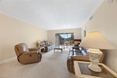 Welcome home to this bright and sunny second-floor, 2-bedroom on Royal Palm Golf Club in Florida - for sale on GolfHomes.com, golf home, golf lot