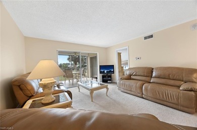 Welcome home to this bright and sunny second-floor, 2-bedroom on Royal Palm Golf Club in Florida - for sale on GolfHomes.com, golf home, golf lot