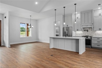 Beautiful new construction in Greenwood's newest and most on Vache-Grasse Country Club in Arkansas - for sale on GolfHomes.com, golf home, golf lot