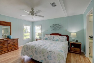 Spacious perimeter lot! This well-maintained home offers an on Barefoot Bay Golf Course in Florida - for sale on GolfHomes.com, golf home, golf lot