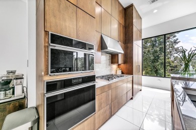 Modern luxury meets functional design in this stunning home on Greystone Country Club in Arkansas - for sale on GolfHomes.com, golf home, golf lot