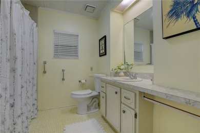Spacious perimeter lot! This well-maintained home offers an on Barefoot Bay Golf Course in Florida - for sale on GolfHomes.com, golf home, golf lot