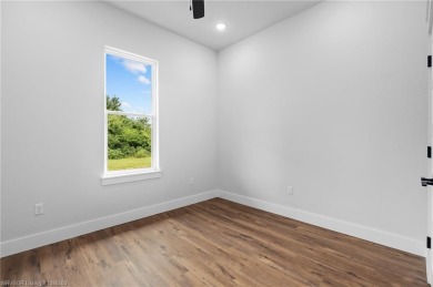 Beautiful new construction in Greenwood's newest and most on Vache-Grasse Country Club in Arkansas - for sale on GolfHomes.com, golf home, golf lot