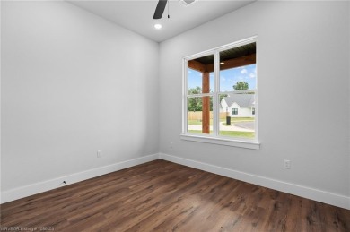 Beautiful new construction in Greenwood's newest and most on Vache-Grasse Country Club in Arkansas - for sale on GolfHomes.com, golf home, golf lot