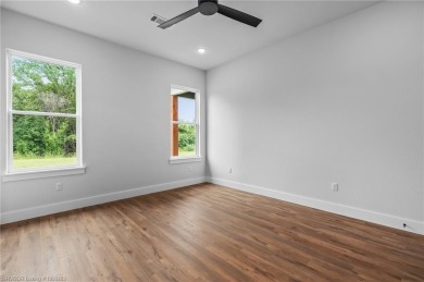 Beautiful new construction in Greenwood's newest and most on Vache-Grasse Country Club in Arkansas - for sale on GolfHomes.com, golf home, golf lot