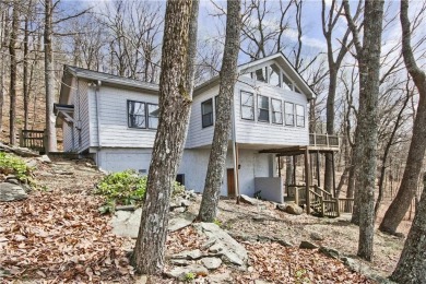 This charming two-bedroom home boasts an open floor plan that on Bent Tree Golf Course in Georgia - for sale on GolfHomes.com, golf home, golf lot