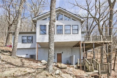 This charming two-bedroom home boasts an open floor plan that on Bent Tree Golf Course in Georgia - for sale on GolfHomes.com, golf home, golf lot