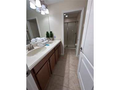 You must see this Fully Furnished 5-Bedroom Pool Home! Resort on The Oasis Club at Champions Gate in Florida - for sale on GolfHomes.com, golf home, golf lot