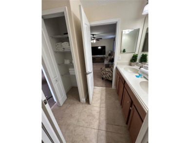 You must see this Fully Furnished 5-Bedroom Pool Home! Resort on The Oasis Club at Champions Gate in Florida - for sale on GolfHomes.com, golf home, golf lot