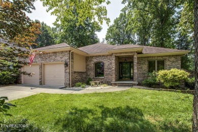 219 Oligi Circle is a charming single-story brick home located on Toqua Golf Course - Loudon County in Tennessee - for sale on GolfHomes.com, golf home, golf lot