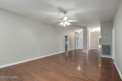 219 Oligi Circle is a charming single-story brick home located on Toqua Golf Course - Loudon County in Tennessee - for sale on GolfHomes.com, golf home, golf lot