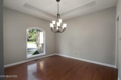 219 Oligi Circle is a charming single-story brick home located on Toqua Golf Course - Loudon County in Tennessee - for sale on GolfHomes.com, golf home, golf lot
