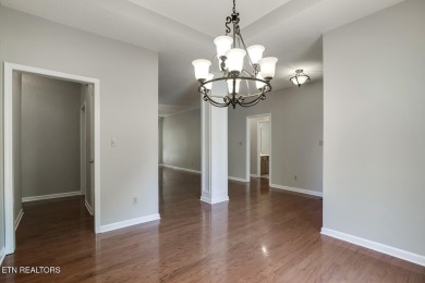 219 Oligi Circle is a charming single-story brick home located on Toqua Golf Course - Loudon County in Tennessee - for sale on GolfHomes.com, golf home, golf lot