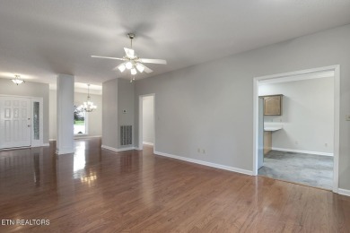 219 Oligi Circle is a charming single-story brick home located on Toqua Golf Course - Loudon County in Tennessee - for sale on GolfHomes.com, golf home, golf lot