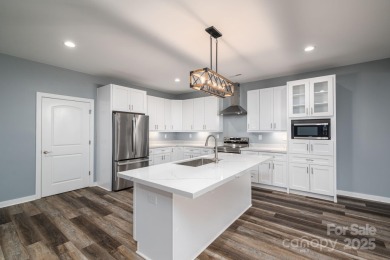 This spacious 1 floor townhouse offers the perfect blend of on  in North Carolina - for sale on GolfHomes.com, golf home, golf lot