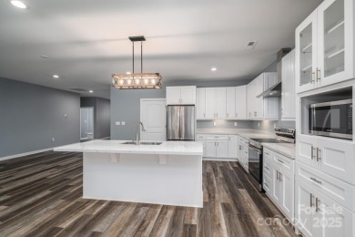 This spacious 1 floor townhouse offers the perfect blend of on  in North Carolina - for sale on GolfHomes.com, golf home, golf lot