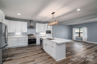 This spacious 1 floor townhouse offers the perfect blend of on  in North Carolina - for sale on GolfHomes.com, golf home, golf lot
