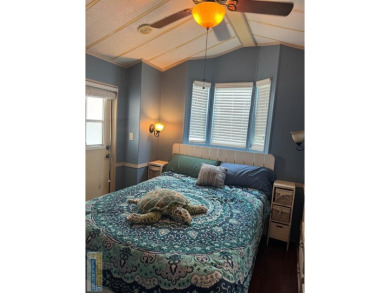 Cute and Cozy interior lot park model in the highly sought after on Long Island Golf Course in Texas - for sale on GolfHomes.com, golf home, golf lot