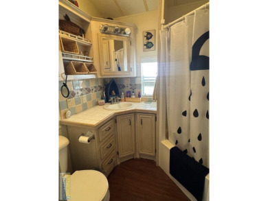 Cute and Cozy interior lot park model in the highly sought after on Long Island Golf Course in Texas - for sale on GolfHomes.com, golf home, golf lot