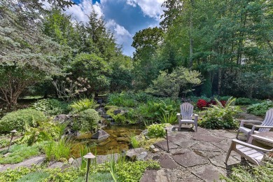 We invite you to experience this enchanting one-of-a-kind on Cullasaja Club in North Carolina - for sale on GolfHomes.com, golf home, golf lot