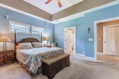 Welcome to this 4-bedroom, 3.5-bath home in the sought-after Sea on Sea Trail Golf Resort in North Carolina - for sale on GolfHomes.com, golf home, golf lot
