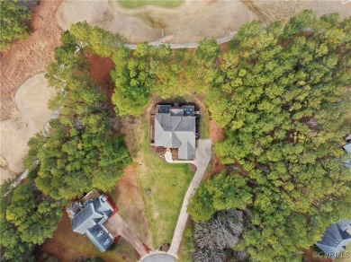 Nestled in the picturesque community of Brickshire, this on Brickshire Golf Club in Virginia - for sale on GolfHomes.com, golf home, golf lot