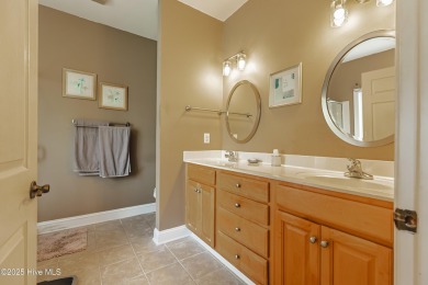 Welcome to this 4-bedroom, 3.5-bath home in the sought-after Sea on Sea Trail Golf Resort in North Carolina - for sale on GolfHomes.com, golf home, golf lot