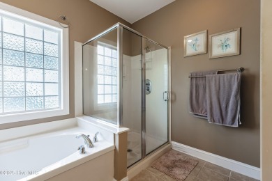 Welcome to this 4-bedroom, 3.5-bath home in the sought-after Sea on Sea Trail Golf Resort in North Carolina - for sale on GolfHomes.com, golf home, golf lot