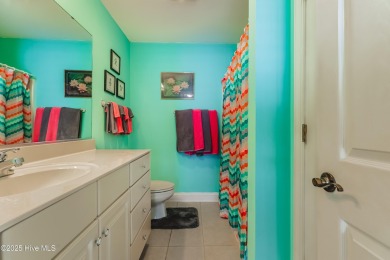 Welcome to this 4-bedroom, 3.5-bath home in the sought-after Sea on Sea Trail Golf Resort in North Carolina - for sale on GolfHomes.com, golf home, golf lot