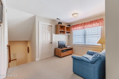 Welcome to this 4-bedroom, 3.5-bath home in the sought-after Sea on Sea Trail Golf Resort in North Carolina - for sale on GolfHomes.com, golf home, golf lot