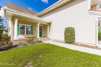 Welcome to this 4-bedroom, 3.5-bath home in the sought-after Sea on Sea Trail Golf Resort in North Carolina - for sale on GolfHomes.com, golf home, golf lot