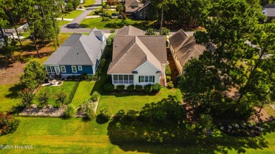 Welcome to this 4-bedroom, 3.5-bath home in the sought-after Sea on Sea Trail Golf Resort in North Carolina - for sale on GolfHomes.com, golf home, golf lot