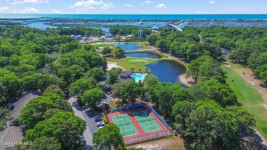 Welcome to this 4-bedroom, 3.5-bath home in the sought-after Sea on Sea Trail Golf Resort in North Carolina - for sale on GolfHomes.com, golf home, golf lot