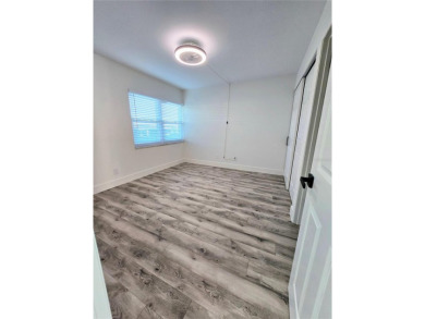 Best price in town for a Fully Remodeled Condo @ Villas Caprie on Largo Golf Course in Florida - for sale on GolfHomes.com, golf home, golf lot