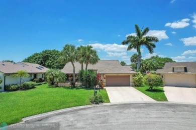 WELCOME TO 5628 PLEASANT VALLEY LANE -- A SERENE RETREAT NESTLED on Boca Delray Golf and Country Club in Florida - for sale on GolfHomes.com, golf home, golf lot