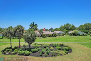 WELCOME TO 5628 PLEASANT VALLEY LANE -- A SERENE RETREAT NESTLED on Boca Delray Golf and Country Club in Florida - for sale on GolfHomes.com, golf home, golf lot