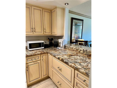 Beautiful Condo living only 10 minutes to the white sandy on Quail Run Golf Club In Naples in Florida - for sale on GolfHomes.com, golf home, golf lot