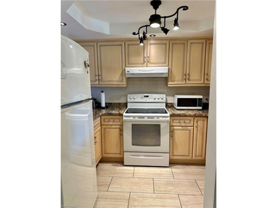 Beautiful Condo living only 10 minutes to the white sandy on Quail Run Golf Club In Naples in Florida - for sale on GolfHomes.com, golf home, golf lot