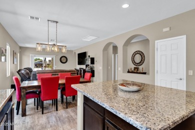 This wonderful single-story residence offers 3 spacious bedrooms on The Golf Club At Johnson Ranch in Arizona - for sale on GolfHomes.com, golf home, golf lot