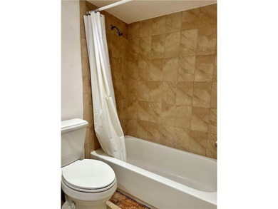 Beautiful Condo living only 10 minutes to the white sandy on Quail Run Golf Club In Naples in Florida - for sale on GolfHomes.com, golf home, golf lot