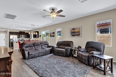 This wonderful single-story residence offers 3 spacious bedrooms on The Golf Club At Johnson Ranch in Arizona - for sale on GolfHomes.com, golf home, golf lot