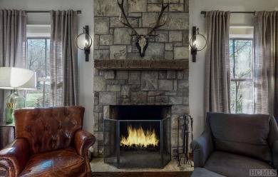 This cool-hip home is warm and inviting from the moment you on Highlands Country Club in North Carolina - for sale on GolfHomes.com, golf home, golf lot
